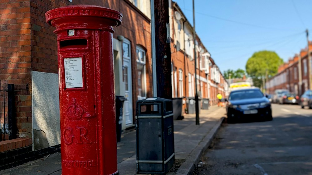 Terraced street with a red post box